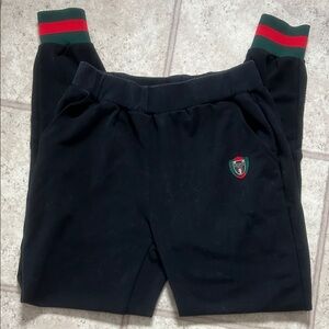 Gucci Black Track Pants with Red & Green Stripe Cuffs